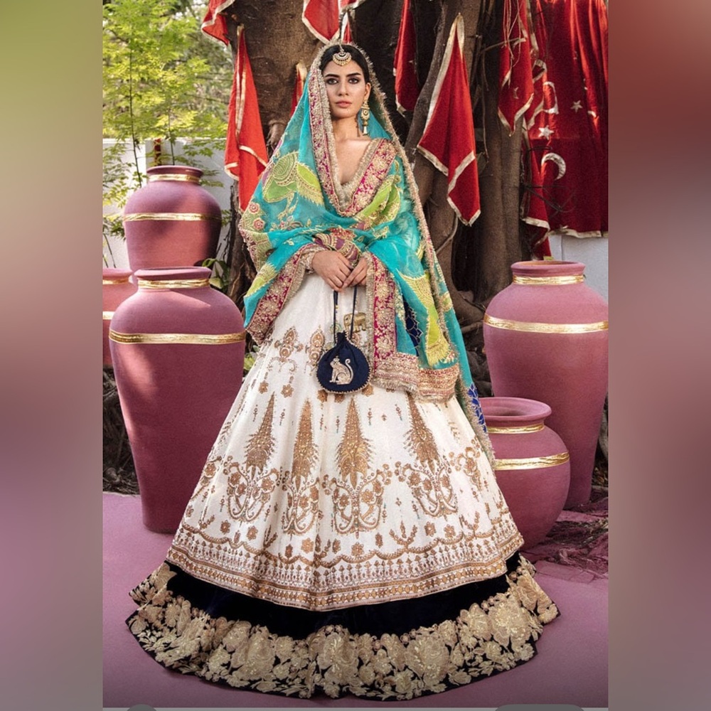 Elegant White and Gold Embroidered Lehenga set by Ali Xeeshan